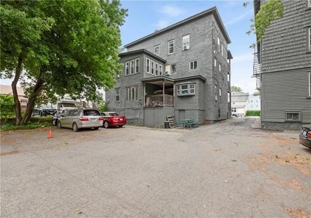 Photo 3 of Multi family home for sale at 414 Rathbun St, Woonsocket, RI 02895 | MLS# 73584906 | Listing updated on 2026-10-11