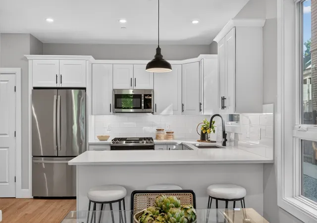 Listing Photo 1 - Condo for sale in 123-125 Centre St Townhouses located at 123-125 Centre St, Boston, MA 02124 - Unit #6
