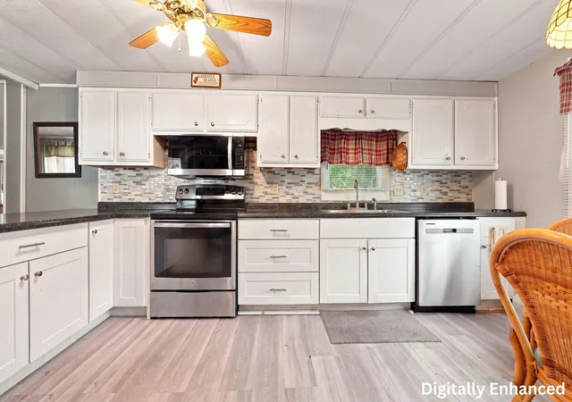 Photo 3 of Manufactured home for sale at 60 Longboat Dr, West Wareham, MA 02576 | MLS# 73572607 | Listing updated on 2026-09-26