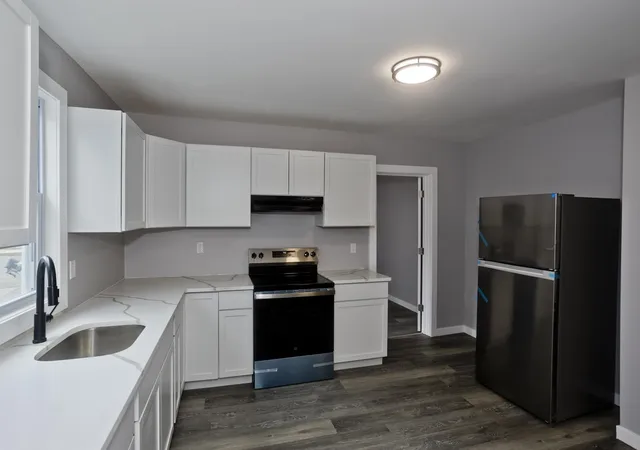 Photo 3 of Multi family home for sale at 12 School St, Holyoke, MA 01040 | MLS# 73570596 | Listing updated on 2026-09-05