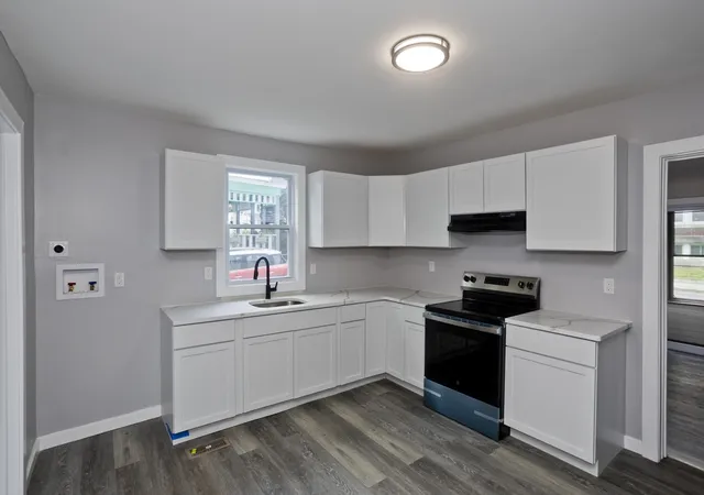 Photo 4 of Multi family home for sale at 12 School St, Holyoke, MA 01040 | MLS# 73570596 | Listing updated on 2026-09-05