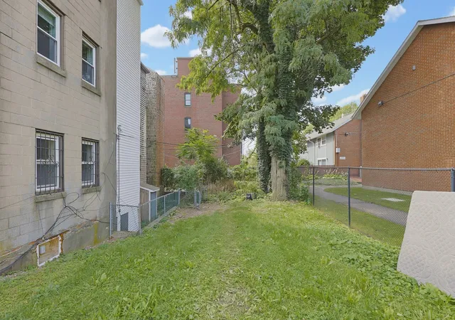 Photo 3 of Multi family home for sale at 117 Regent St, Roxbury, MA 02119 | MLS# 73581436 | Listing updated on 2026-10-17
