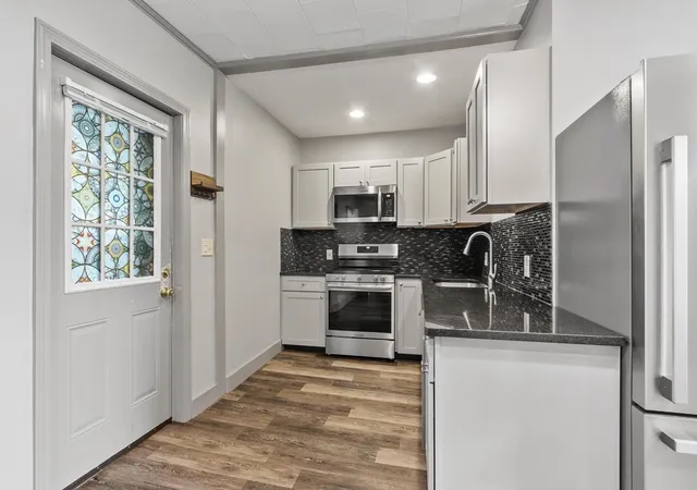 Photo 2 of Multi family home for sale at 21 Old Leominster Rd, Fitchburg, MA 01420 | MLS# 73571515 | Listing updated on 2026-09-07
