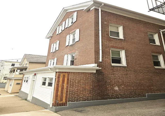Photo 1 of Multi family home for sale at 558 E School St, Woonsocket, RI 02895 | MLS# 73580420 | Listing updated on 2026-09-25