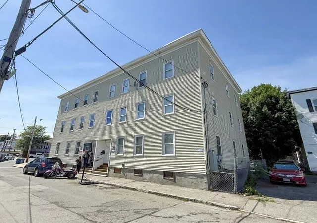 Photo 3 of Multi family home for sale at 18 Auburn St, Lowell, MA 01852 | MLS# 73588592 | Listing updated on 2026-10-12