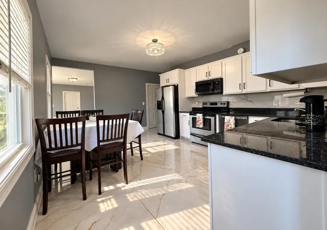 Listing Photo 1 - Condo for sale in building located at 299 Adams St, Abington, MA 02351 - Unit #1