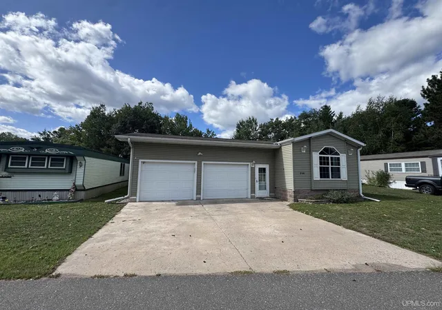 Photo 2 of Manufactured home for sale at W8007 S Us Hwy 2/141, Iron Mountain, MI 49801 | MLS# 50221401 | Listing updated on 2026-10-06
