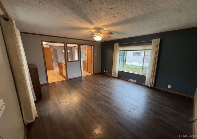 Photo 4 of Manufactured home for sale at W8007 S US Hwy 2/141, Iron Mountain, MI 49801 | MLS# 50221401 | Listing updated on 2026-10-06