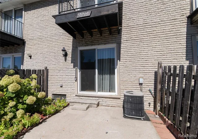 Listing Photo 1 - Condo for sale in building located at 4268 15 Mile Rd, Sterling Heights, MI 48310 - Unit #