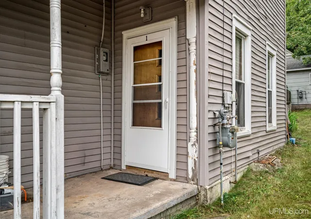 Photo 3 of Multi family home for sale at 1006/1008 Champion St, Marquette, MI 49855 | MLS# 50221212 | Listing updated on 2026-09-18
