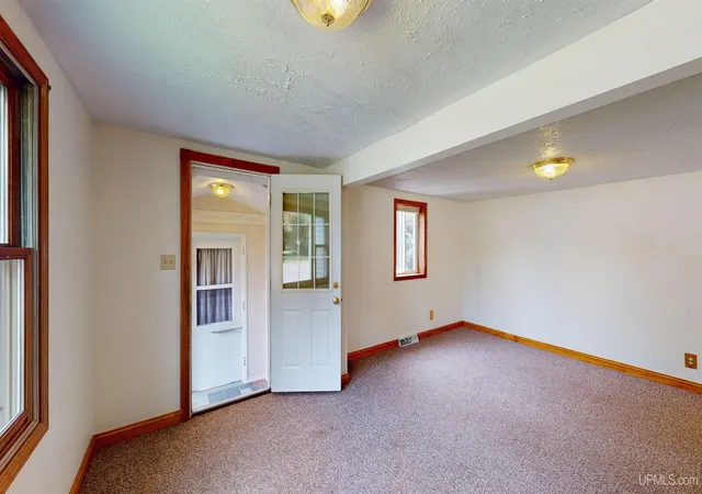 Photo 3 of Single family home for sale at 23433 Elm Ave, Dollar Bay, MI 49922 | MLS# 50220711 | Listing updated on 2026-09-17