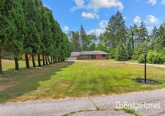 Photo 2 of Single family home for sale at 311 Honey Crk Ave, Ada, MI 49301 | MLS# 70553044 | Listing updated on 2026-09-10