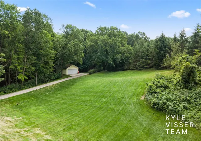 Photo 2 of Single family home for sale at 1873 Grand River Dr, Ada, MI 49301 | MLS# 70553641 | Listing updated on 2026-10-28