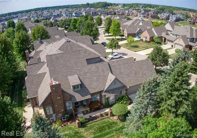 Listing Photo 1 - Condo for sale in building located at 10844 Sparkling Waters Ct, South Lyon, MI 48116