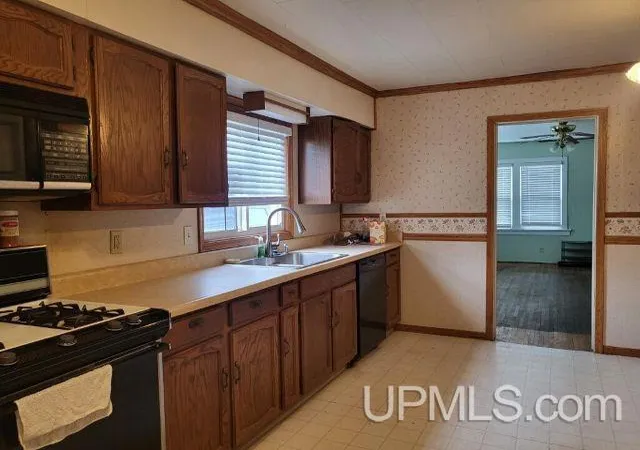 Photo 3 of Single family home for sale at 305 Riehle Rd, Kingsford, MI 49802 | MLS# 50220941 | Listing updated on 2026-09-10