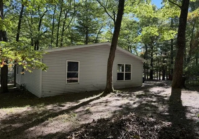 Photo 3 of Single family home for sale at 302 Wilson Ave, Harrison, MI 48625 | MLS# 50223132 | Listing updated on 2026-10-02