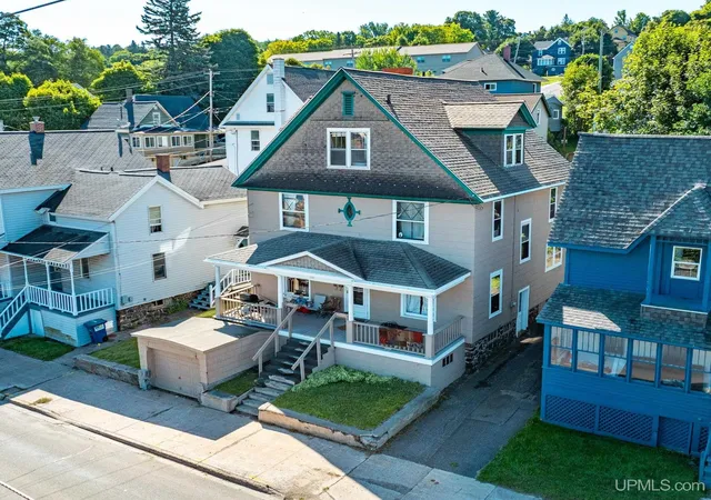 Single family home for sale at 107 E Montezuma Ave, Houghton, MI 49931 | MLS# 50220537