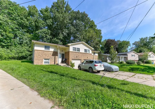 Photo 1 of Multi family home for sale at 2931 2933 Okemos Dr, Grand Rapids, MI 49546 | MLS# 70559473 | Listing updated on 2026-09-27