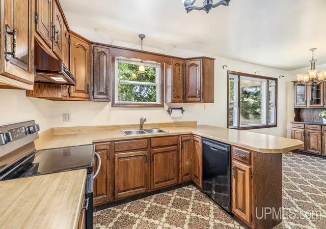 Photo 3 of Single family home for sale at 140 Campbell St, Kingsford, MI 49802 | MLS# 50220681 | Listing updated on 2026-09-29