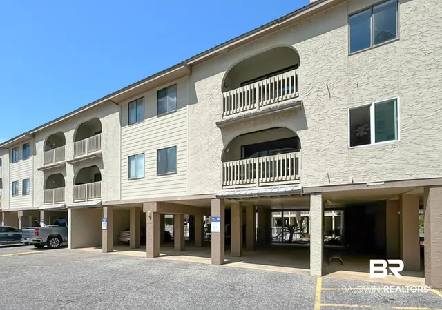 Photo 1 of Townhouse for sale at 930 W Beach Blvd #118, Gulf Shores, AL 36542 | MLS# 411118 | Listing updated on 2026-09-24