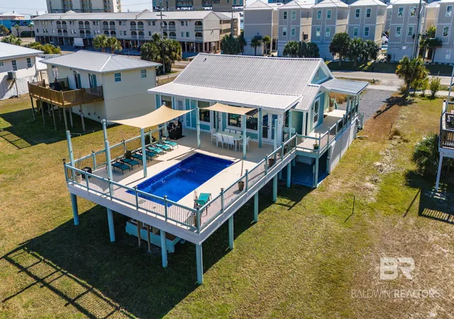 Photo 1 of Single family home for sale at 942 W Lagoon Ave, Gulf Shores, AL 36542 | MLS# 411698 | Listing updated on 2026-10-15