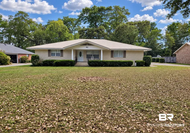 Photo 1 of Single family home for sale at 411 W Persimmon Ave, Foley, AL 36535 | MLS# 409065 | Listing updated on 2026-10-09