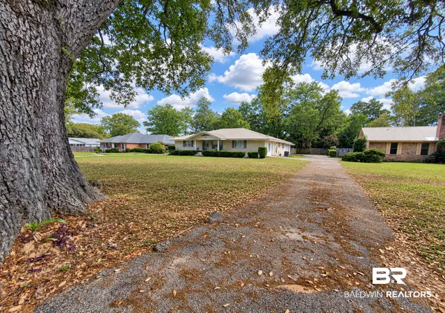 Photo 2 of Single family home for sale at 411 W Persimmon Ave, Foley, AL 36535 | MLS# 409065 | Listing updated on 2026-10-09