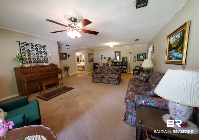 Photo 3 of Single family home for sale at 411 W Persimmon Ave, Foley, AL 36535 | MLS# 409065 | Listing updated on 2026-10-09