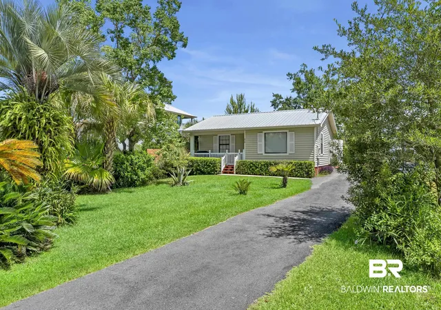 Photo 1 of Single family home for sale at 810 W Canal Dr, Gulf Shores, AL 36542 | MLS# 399560 | Listing updated on 2026-09-09