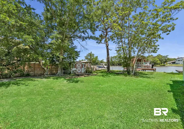 Photo 3 of Single family home for sale at 810 W Canal Dr, Gulf Shores, AL 36542 | MLS# 399560 | Listing updated on 2026-09-09