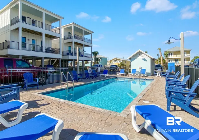 Photo 2 of Single family home for sale at 521 E 1st Avenue #B, Gulf Shores, AL 36542 | MLS# 410927 | Listing updated on 2026-10-07