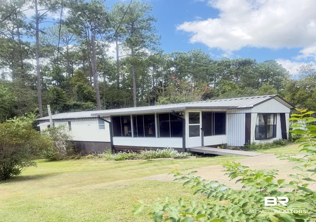 Single family home for sale at 1407 Ridgewood Dr, Lillian, AL 36549 | MLS# 410426