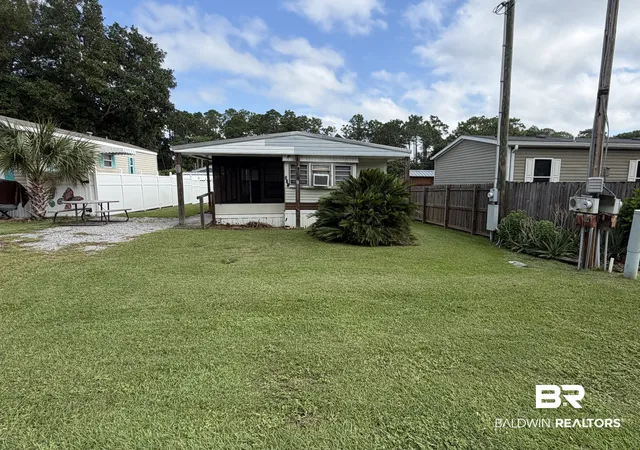 Photo 1 of Single family home for sale at 701 Escambia Loop, Lillian, AL 36549 | MLS# 410145 | Listing updated on 2026-09-16