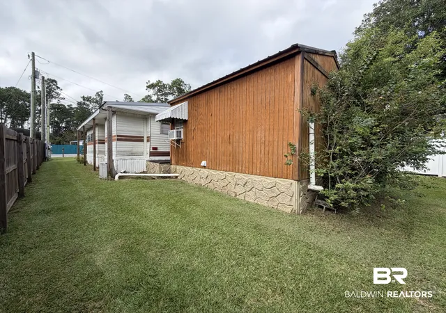 Photo 3 of Single family home for sale at 701 Escambia Loop, Lillian, AL 36549 | MLS# 410145 | Listing updated on 2026-09-16