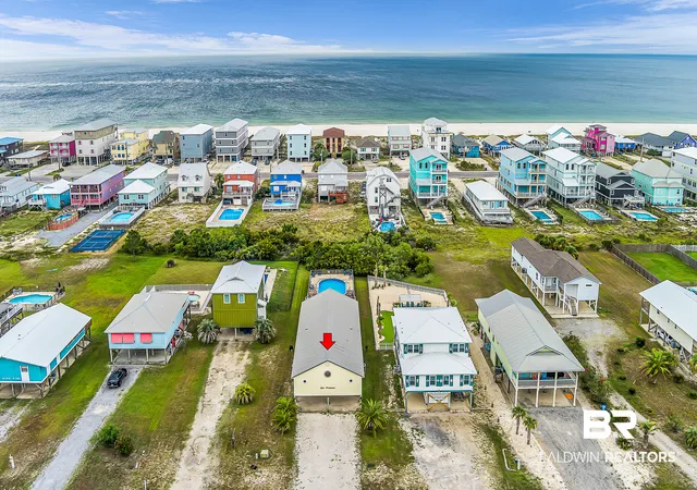 Photo 1 of Townhouse for sale at 1389 W Lagoon Ave #UNIT B, Gulf Shores, AL 36542 | MLS# 409824 | Listing updated on 2026-09-15