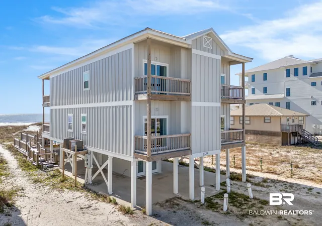 Photo 2 of Single family home for sale at 1329 W Beach Blvd #East & West, Gulf Shores, AL 36542 | MLS# 407721 | Listing updated on 2026-10-15