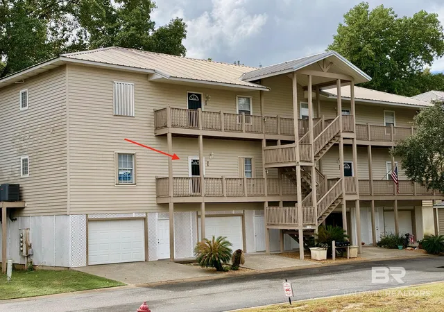 Photo 1 of Townhouse for sale at 4 Yacht Clb Dr #86, Daphne, AL 36526 | MLS# 411492 | Listing updated on 2026-10-01