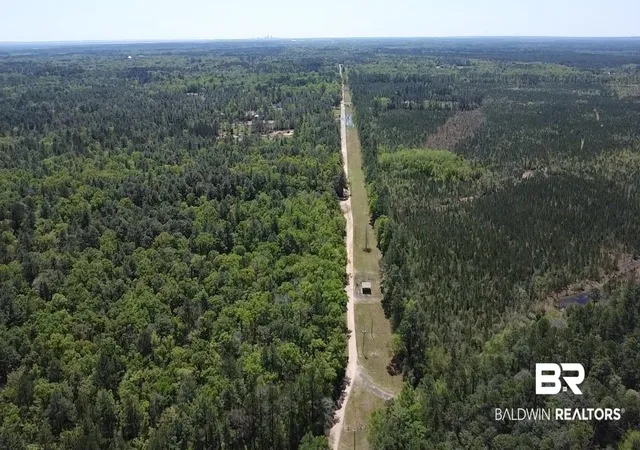 Photo 1 of Land for sale at 0 I 65 Service Rd, Creola, AL 36525 | MLS# 377732 | Listing updated on 2026-09-16