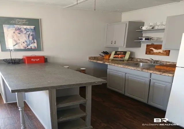 Photo 3 of Single family home for sale at 12200 Mary Ann Beach Rd, Fairhope, AL 36532 | MLS# 410132 | Listing updated on 2026-09-08