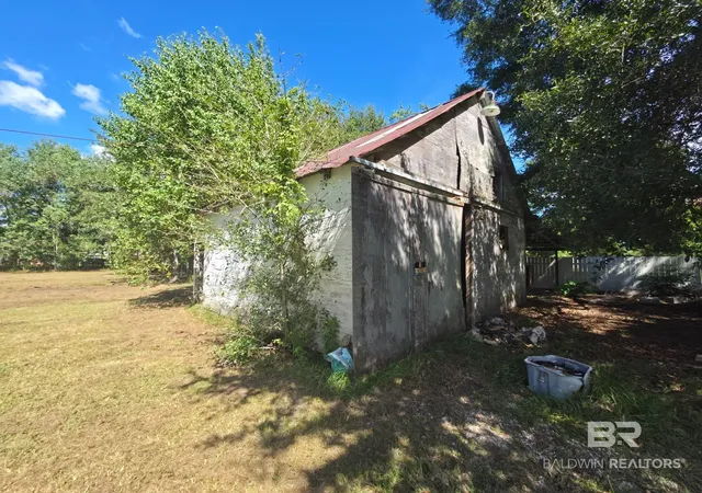 Photo 3 of Single family home for sale at 203 12th Avenue, Atmore, AL 36502 | MLS# 411584 | Listing updated on 2026-10-08