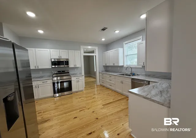 Photo 2 of Single family home for sale at 103 Forest Ave, Atmore, AL 36502 | MLS# 409793 | Listing updated on 2026-09-01