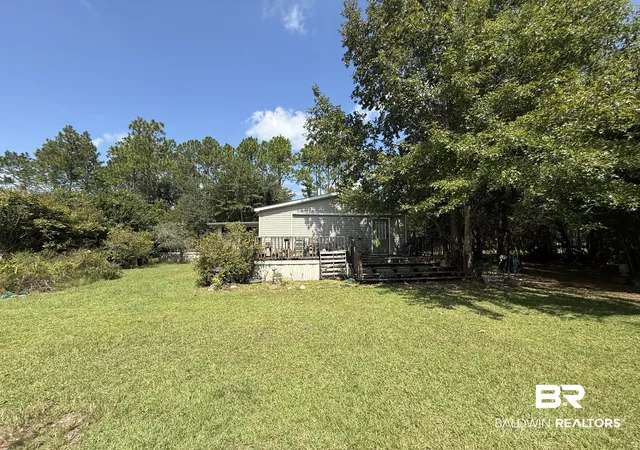Photo 1 of Single family home for sale at 21389 Glass And Spivey Rd, Robertsdale, AL 36567 | MLS# 411073 | Listing updated on 2026-09-23