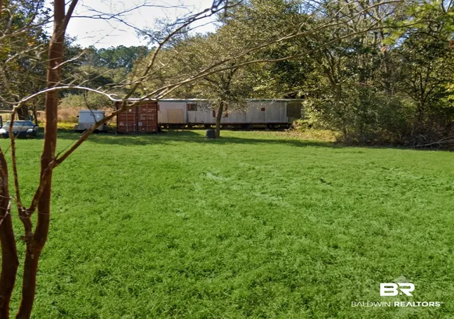 Photo 2 of Land for sale at 25141 Burgett Ln, Robertsdale, AL 36567 | MLS# 410621 | Listing updated on 2026-09-14