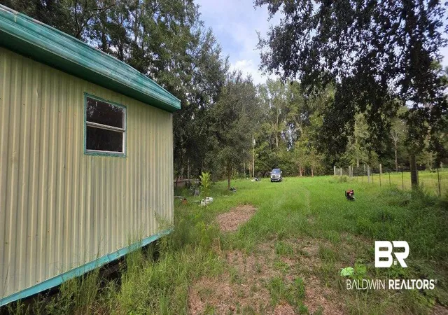 Photo 3 of Land for sale at 25141 Burgett Ln, Robertsdale, AL 36567 | MLS# 410621 | Listing updated on 2026-09-14