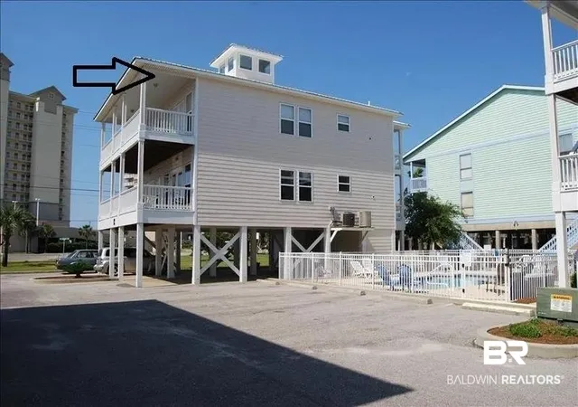 Photo 1 of Townhouse for sale at 908 W Lagoon Ave #1B, Gulf Shores, AL 36542 | MLS# 410737 | Listing updated on 2026-09-15