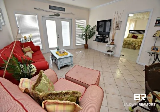 Photo 3 of Townhouse for sale at 908 W Lagoon Ave #1B, Gulf Shores, AL 36542 | MLS# 410737 | Listing updated on 2026-09-15