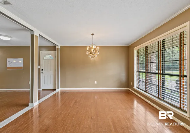 Photo 3 of Single family home for sale at 1303 Bradley Ave, Bay Minette, AL 36507 | MLS# 410763 | Listing updated on 2026-09-30