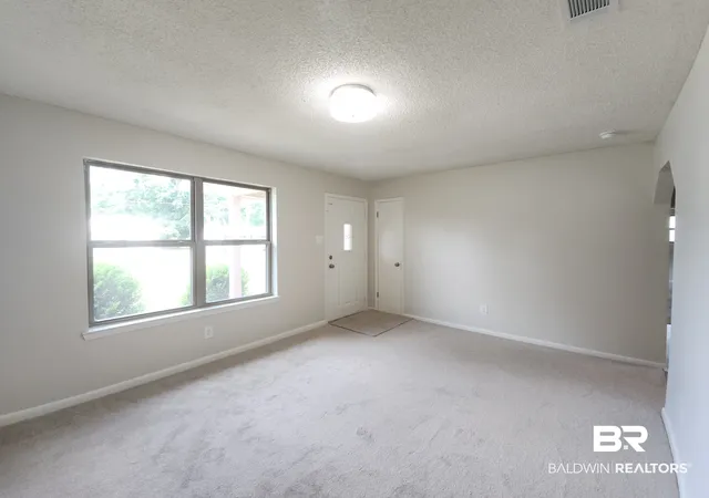 Photo 3 of Townhouse for sale at 313 Woodlawn Ave, Atmore, AL 36502 | MLS# 410459 | Listing updated on 2026-09-09