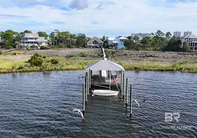 Photo 3 of Single family home for sale at 29813 Saint John Dr, Orange Beach, AL 36561 | MLS# 411865 | Listing updated on 2026-10-13