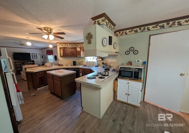 Photo 2 of Manufactured home for sale at 1558 Valencia Dr, Lillian, AL 36549 | MLS# 411648 | Listing updated on 2026-10-06
